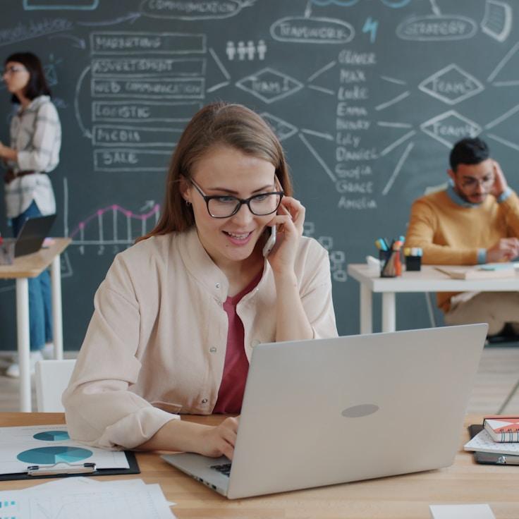 Mobile app project planning workspace with devices and development tools